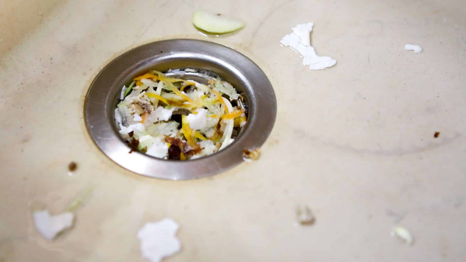 Dishwasher maintenance for clogged drain.