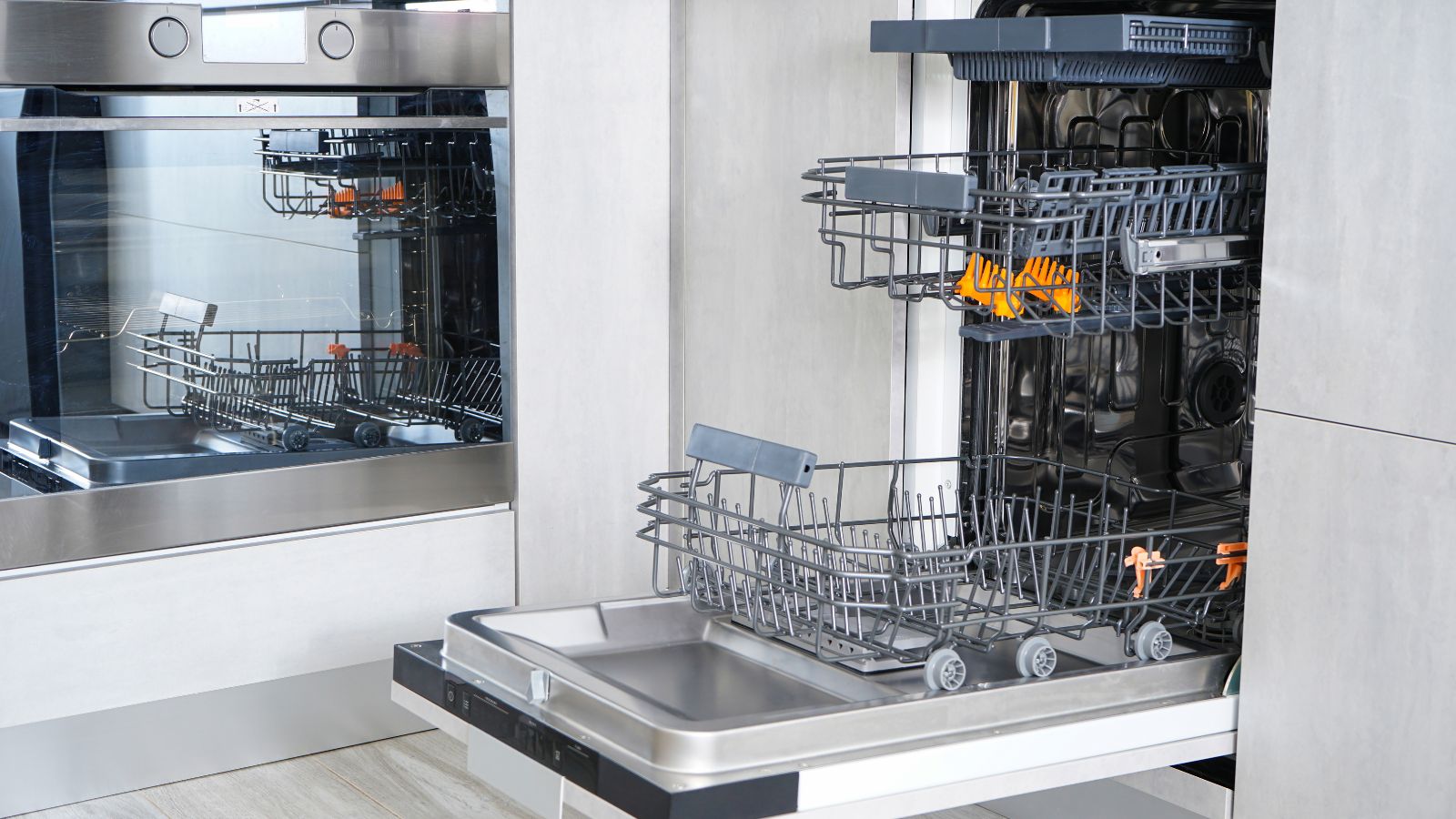 What causes white residue on dishes from dishwasher?