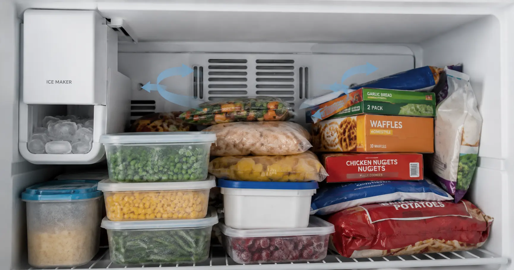 Overpacked freezer blocking airflow and slowing down refrigerator ice maker production
